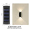Vue détaillée de la décoration murale extérieure avec éclairage LED, montrant la qualité du matériau et du design moderne.