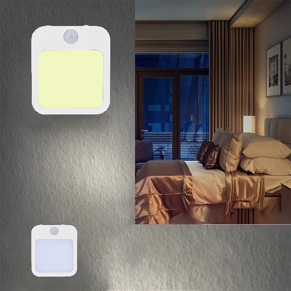 Lumière douce la nuit dans un couloir grâce à la veilleuse LED automatique

